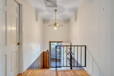 Million-dollar lake and mountain views define this on Waters Edge Country Club in Virginia - for sale on GolfHomes.com, golf home, golf lot