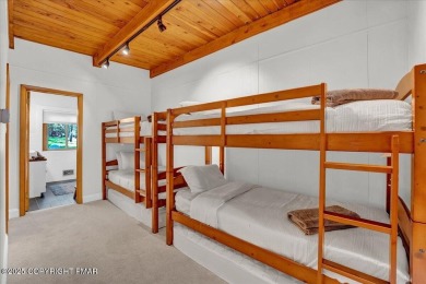 Step into this 3-bedroom, 2-bath Lake Harmony home showcasing on Split Rock Resort and Country Club in Pennsylvania - for sale on GolfHomes.com, golf home, golf lot