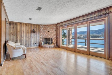 Million-dollar lake and mountain views define this on Waters Edge Country Club in Virginia - for sale on GolfHomes.com, golf home, golf lot