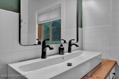 Step into this 3-bedroom, 2-bath Lake Harmony home showcasing on Split Rock Resort and Country Club in Pennsylvania - for sale on GolfHomes.com, golf home, golf lot