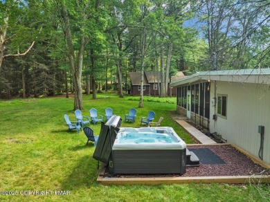 Step into this 3-bedroom, 2-bath Lake Harmony home showcasing on Split Rock Resort and Country Club in Pennsylvania - for sale on GolfHomes.com, golf home, golf lot