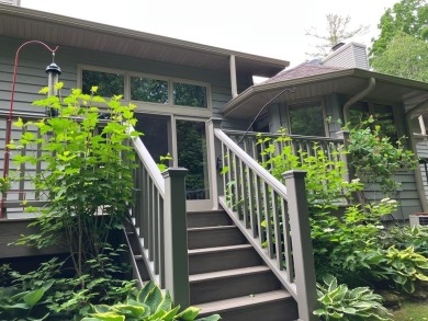 Condo living at its best with easy access to all that Door on Cherry Hills Golf Course in Wisconsin - for sale on GolfHomes.com, golf home, golf lot