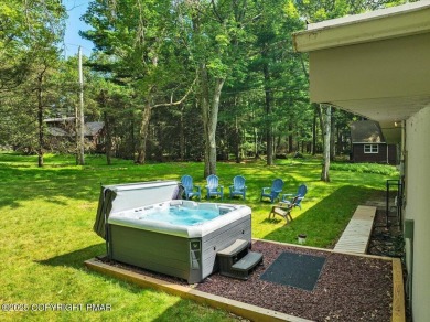 Step into this 3-bedroom, 2-bath Lake Harmony home showcasing on Split Rock Resort and Country Club in Pennsylvania - for sale on GolfHomes.com, golf home, golf lot