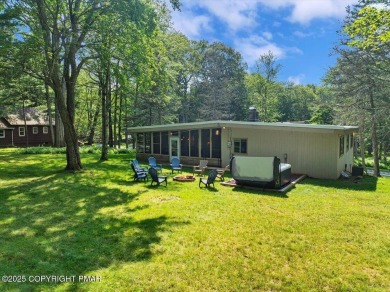 Step into this 3-bedroom, 2-bath Lake Harmony home showcasing on Split Rock Resort and Country Club in Pennsylvania - for sale on GolfHomes.com, golf home, golf lot