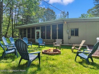 Step into this 3-bedroom, 2-bath Lake Harmony home showcasing on Split Rock Resort and Country Club in Pennsylvania - for sale on GolfHomes.com, golf home, golf lot