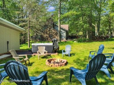 Step into this 3-bedroom, 2-bath Lake Harmony home showcasing on Split Rock Resort and Country Club in Pennsylvania - for sale on GolfHomes.com, golf home, golf lot