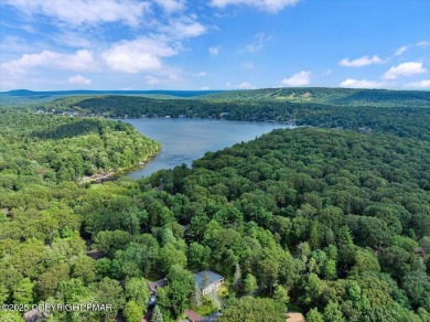 Step into this 3-bedroom, 2-bath Lake Harmony home showcasing on Split Rock Resort and Country Club in Pennsylvania - for sale on GolfHomes.com, golf home, golf lot