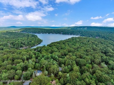 Step into this 3-bedroom, 2-bath Lake Harmony home showcasing on Split Rock Resort and Country Club in Pennsylvania - for sale on GolfHomes.com, golf home, golf lot
