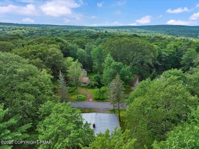 Step into this 3-bedroom, 2-bath Lake Harmony home showcasing on Split Rock Resort and Country Club in Pennsylvania - for sale on GolfHomes.com, golf home, golf lot