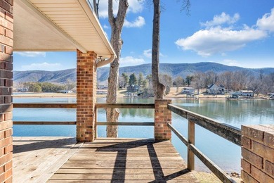 Million-dollar lake and mountain views define this on Waters Edge Country Club in Virginia - for sale on GolfHomes.com, golf home, golf lot