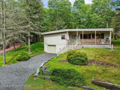 Step into this 3-bedroom, 2-bath Lake Harmony home showcasing on Split Rock Resort and Country Club in Pennsylvania - for sale on GolfHomes.com, golf home, golf lot