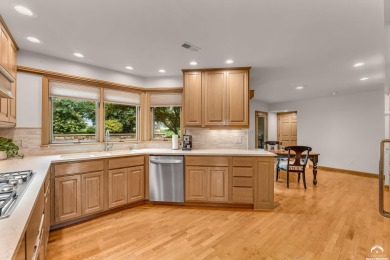 A luxury townhome, a showstopper, a Lawrence favorite - this on Alvamar Country Club in Kansas - for sale on GolfHomes.com, golf home, golf lot