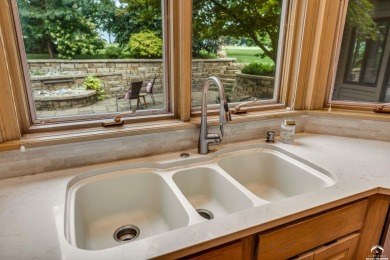 A luxury townhome, a showstopper, a Lawrence favorite - this on Alvamar Country Club in Kansas - for sale on GolfHomes.com, golf home, golf lot