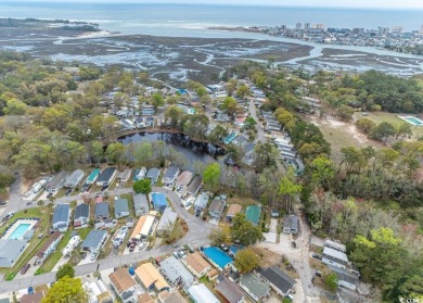 **Coastal Charm & Resort Living in North Myrtle Beach!** on Tidewater Golf Club and Plantation in South Carolina - for sale on GolfHomes.com, golf home, golf lot