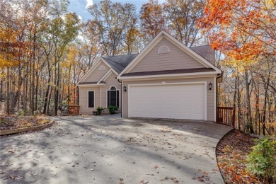 Nestled on a large, private, wooded lot in the serene Bent Tree on Bent Tree Golf Course in Georgia - for sale on GolfHomes.com, golf home, golf lot