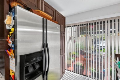 Discover this impeccably maintained townhome nestled in one of on Costa Greens Golf Club in Florida - for sale on GolfHomes.com, golf home, golf lot