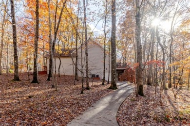 Nestled on a large, private, wooded lot in the serene Bent Tree on Bent Tree Golf Course in Georgia - for sale on GolfHomes.com, golf home, golf lot