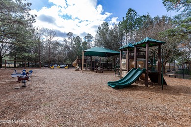 **1336 River City Street** is tucked at the end of a quiet on King and Bear Golf Course/World Golf Village in Florida - for sale on GolfHomes.com, golf home, golf lot