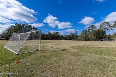 **1336 River City Street** is tucked at the end of a quiet on King and Bear Golf Course/World Golf Village in Florida - for sale on GolfHomes.com, golf home, golf lot