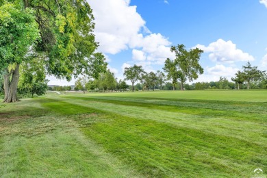 A luxury townhome, a showstopper, a Lawrence favorite - this on Alvamar Country Club in Kansas - for sale on GolfHomes.com, golf home, golf lot