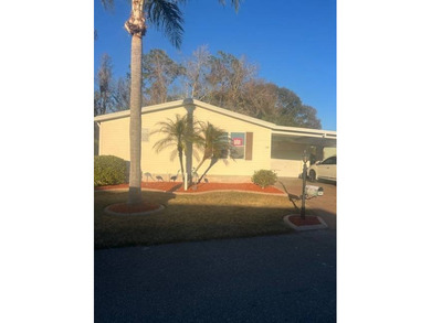 Welcome to your dream home in the highly sought-after, active on Hamptons Golf Club in Florida - for sale on GolfHomes.com, golf home, golf lot