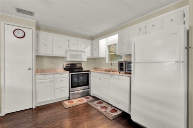 GREAT HOME! Welcome to KOVE ESTATES, a community that offers on Cypress Point RV Golf Club in Florida - for sale on GolfHomes.com, golf home, golf lot