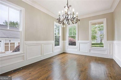 Located within the gates of prestigious Governors Towne Club on The Governors Towne Club in Georgia - for sale on GolfHomes.com, golf home, golf lot