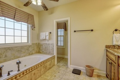 IMMACULATE custom-built 4 bedroom/3.5 bathroom home overlooking on Woodfin Ridge Golf Club in South Carolina - for sale on GolfHomes.com, golf home, golf lot