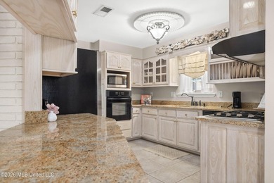 Waterfront living in one of Biloxi's most desirable and peaceful on Sunkist Country Club, Inc. in Mississippi - for sale on GolfHomes.com, golf home, golf lot