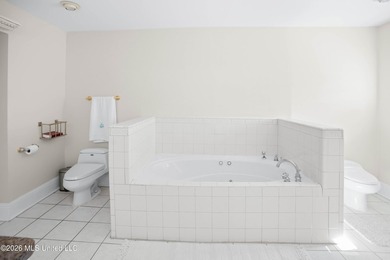 Waterfront living in one of Biloxi's most desirable and peaceful on Sunkist Country Club, Inc. in Mississippi - for sale on GolfHomes.com, golf home, golf lot