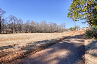 IMMACULATE custom-built 4 bedroom/3.5 bathroom home overlooking on Woodfin Ridge Golf Club in South Carolina - for sale on GolfHomes.com, golf home, golf lot