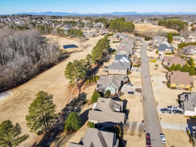 IMMACULATE custom-built 4 bedroom/3.5 bathroom home overlooking on Woodfin Ridge Golf Club in South Carolina - for sale on GolfHomes.com, golf home, golf lot