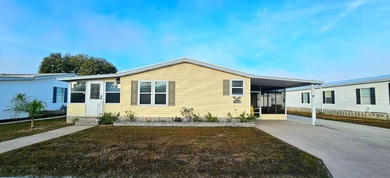 Furnished, spacious 2 bedroom 2 bath home in 55 + Resort style on Zephyrhills Municipal Golf Course in Florida - for sale on GolfHomes.com, golf home, golf lot