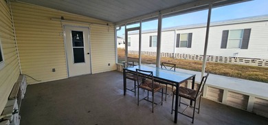 Furnished, spacious 2 bedroom 2 bath home in 55 + Resort style on Zephyrhills Municipal Golf Course in Florida - for sale on GolfHomes.com, golf home, golf lot