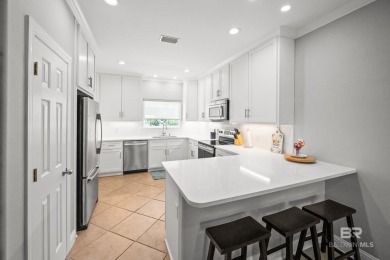 Tucked along one of Orange Beach's most sought-after waterfront on Orange Beach Golf Center in Alabama - for sale on GolfHomes.com, golf home, golf lot
