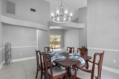 Tucked away among tree-lined streets and mature landscaping in on River Wilderness Golf and Country Club in Florida - for sale on GolfHomes.com, golf home, golf lot