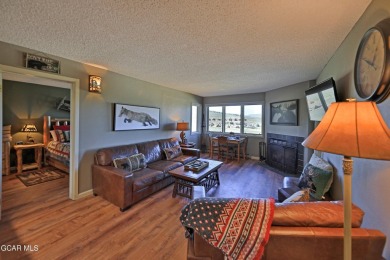 Move-in-ready 2-bedroom, 2-bathroom ski-in/ski-out condo located on Headwaters Golf Course At Granby Ranch in Colorado - for sale on GolfHomes.com, golf home, golf lot