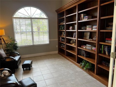 Tucked away among tree-lined streets and mature landscaping in on River Wilderness Golf and Country Club in Florida - for sale on GolfHomes.com, golf home, golf lot