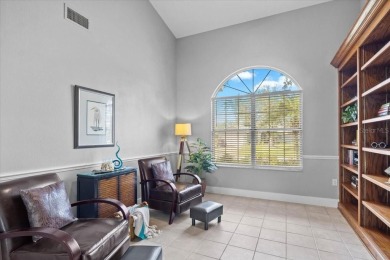 Tucked away among tree-lined streets and mature landscaping in on River Wilderness Golf and Country Club in Florida - for sale on GolfHomes.com, golf home, golf lot