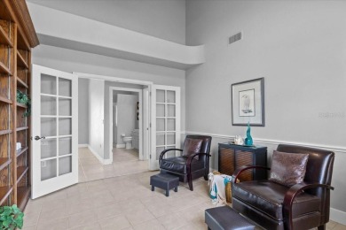 Tucked away among tree-lined streets and mature landscaping in on River Wilderness Golf and Country Club in Florida - for sale on GolfHomes.com, golf home, golf lot