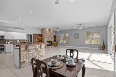 Tucked away among tree-lined streets and mature landscaping in on River Wilderness Golf and Country Club in Florida - for sale on GolfHomes.com, golf home, golf lot