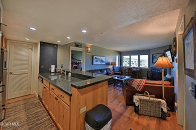 Move-in-ready 2-bedroom, 2-bathroom ski-in/ski-out condo located on Headwaters Golf Course At Granby Ranch in Colorado - for sale on GolfHomes.com, golf home, golf lot