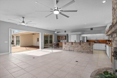 Tucked away among tree-lined streets and mature landscaping in on River Wilderness Golf and Country Club in Florida - for sale on GolfHomes.com, golf home, golf lot