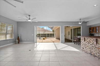 Tucked away among tree-lined streets and mature landscaping in on River Wilderness Golf and Country Club in Florida - for sale on GolfHomes.com, golf home, golf lot