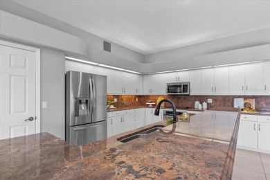 Tucked away among tree-lined streets and mature landscaping in on River Wilderness Golf and Country Club in Florida - for sale on GolfHomes.com, golf home, golf lot