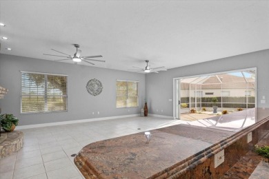 Tucked away among tree-lined streets and mature landscaping in on River Wilderness Golf and Country Club in Florida - for sale on GolfHomes.com, golf home, golf lot