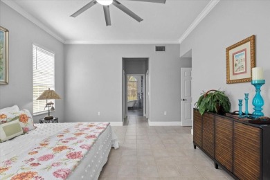 Tucked away among tree-lined streets and mature landscaping in on River Wilderness Golf and Country Club in Florida - for sale on GolfHomes.com, golf home, golf lot