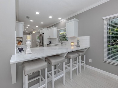 This beautifully updated 2,024 sq. ft. maintenance free home is on Waterford Golf Club in Florida - for sale on GolfHomes.com, golf home, golf lot