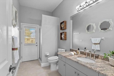 Tucked away among tree-lined streets and mature landscaping in on River Wilderness Golf and Country Club in Florida - for sale on GolfHomes.com, golf home, golf lot