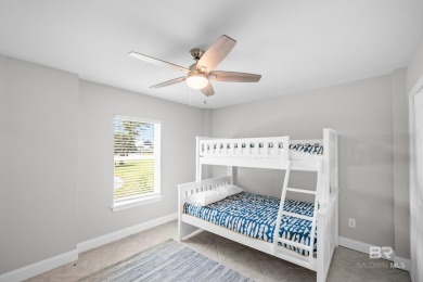 Tucked along one of Orange Beach's most sought-after waterfront on Orange Beach Golf Center in Alabama - for sale on GolfHomes.com, golf home, golf lot